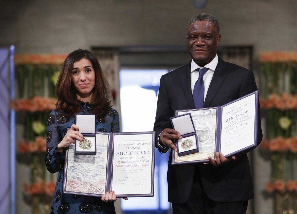 The Peace Price laureates Dr. Denis Mukwege from Congo and Nadia Murad from Iraq, left, pose with their medals during the Nobel Peace Prize Ceremony in Oslo Town Hall, Oslo, Monday Dec. 10, 2018. Dr. Denis Mukwege and Nadia Murad receive the Nobel Peace Prize recognising their efforts to end the use of sexual violence as a weapon of war and armed conflict. AP/PTI