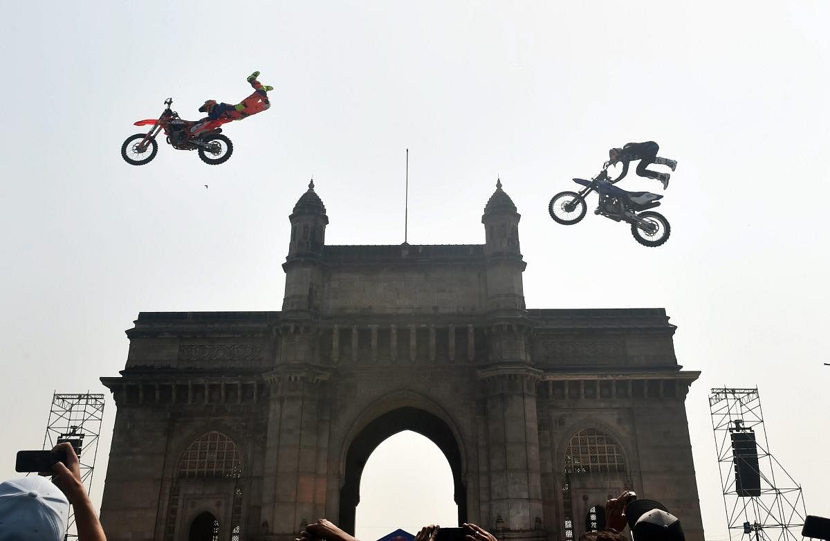  Motorcross athletes perform bike stunts at Gateway of India during the Red Bull FMX JAM event in Mumbai, Saturday, Feb. 2, 2019. (PTI Photo/Mitesh Bhuvad)