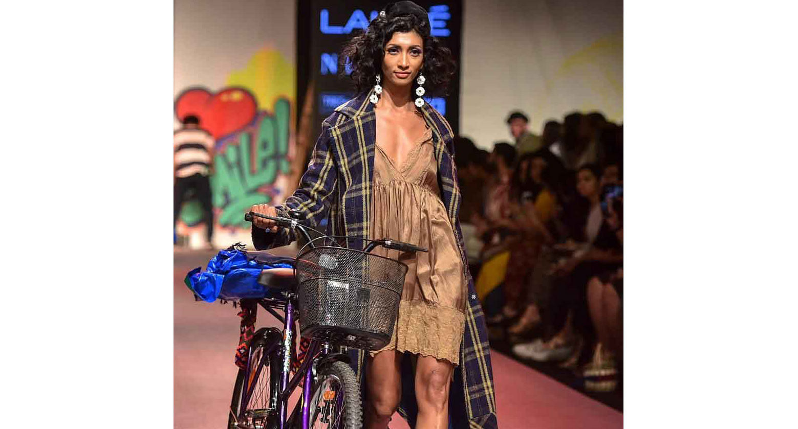 A model walks the ramp showcasing the collection of designer Aneesh Arora during the Lakmé Fashion Week Summer Resort 2019, in Mumbai on Jan. 31, 2019. Credit: (PTI Photo)