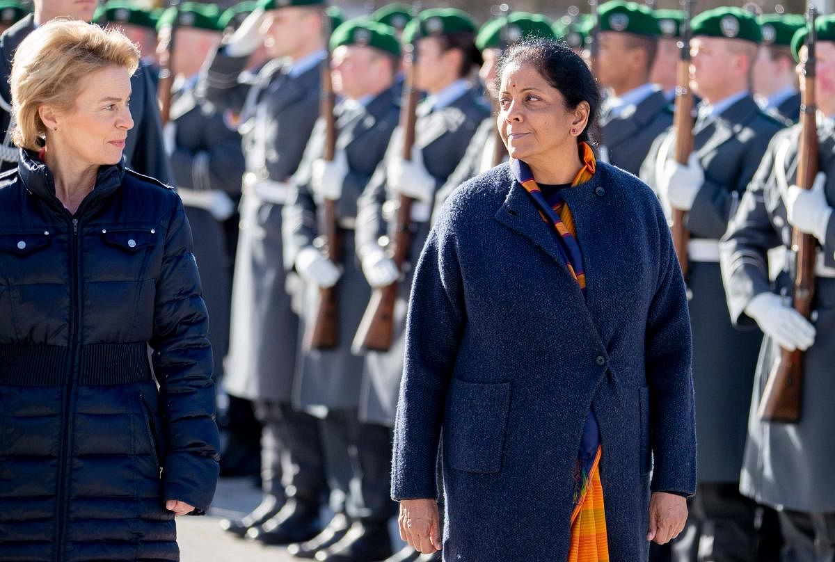 Ursula von der German Defence Minister Ursula von der Leyen (R) greets her Indian counterpart Nirmala Sitharaman with military honours at the Defence ministry in Berlin, on February 12, 2018. (Photo by Christoph Soeder / dpa / AFP)
