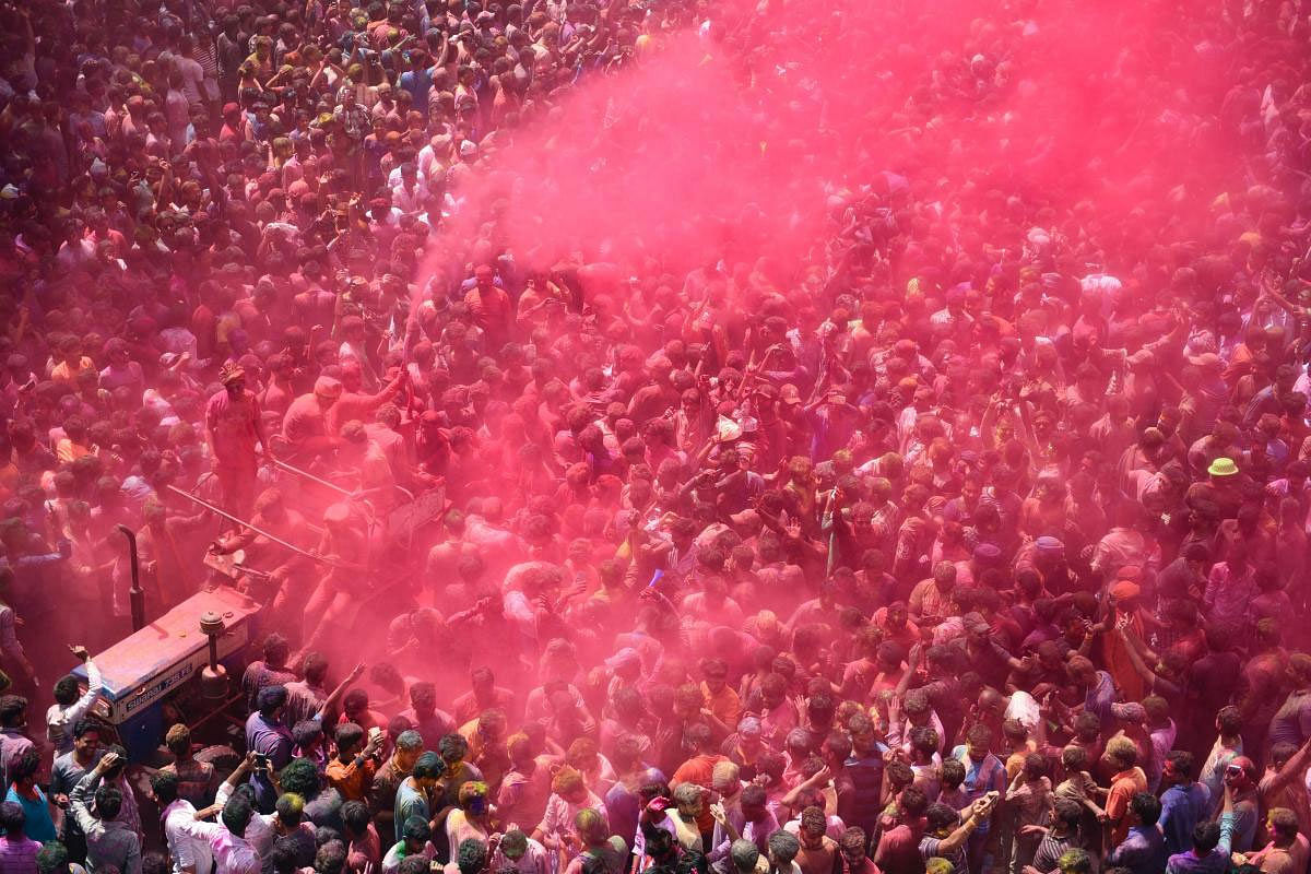 An aerial view of people celebrating Rang Panchami festival in Indore, Monday, March 25, 2019. (PTI Photo)