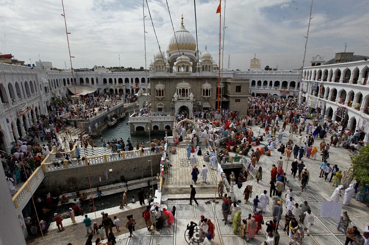 Hasan Abdal: Sikh pilgrims attend the Vasakhi festival, at the shrine of Gurdwara Punja Sahib, the second most sacred place for Sikhs, in Hasan Abdal, some 50 kilometers (31 Miles) from Islamabad, Pakistan, Sunday, April 14, 2019. AP/PTI