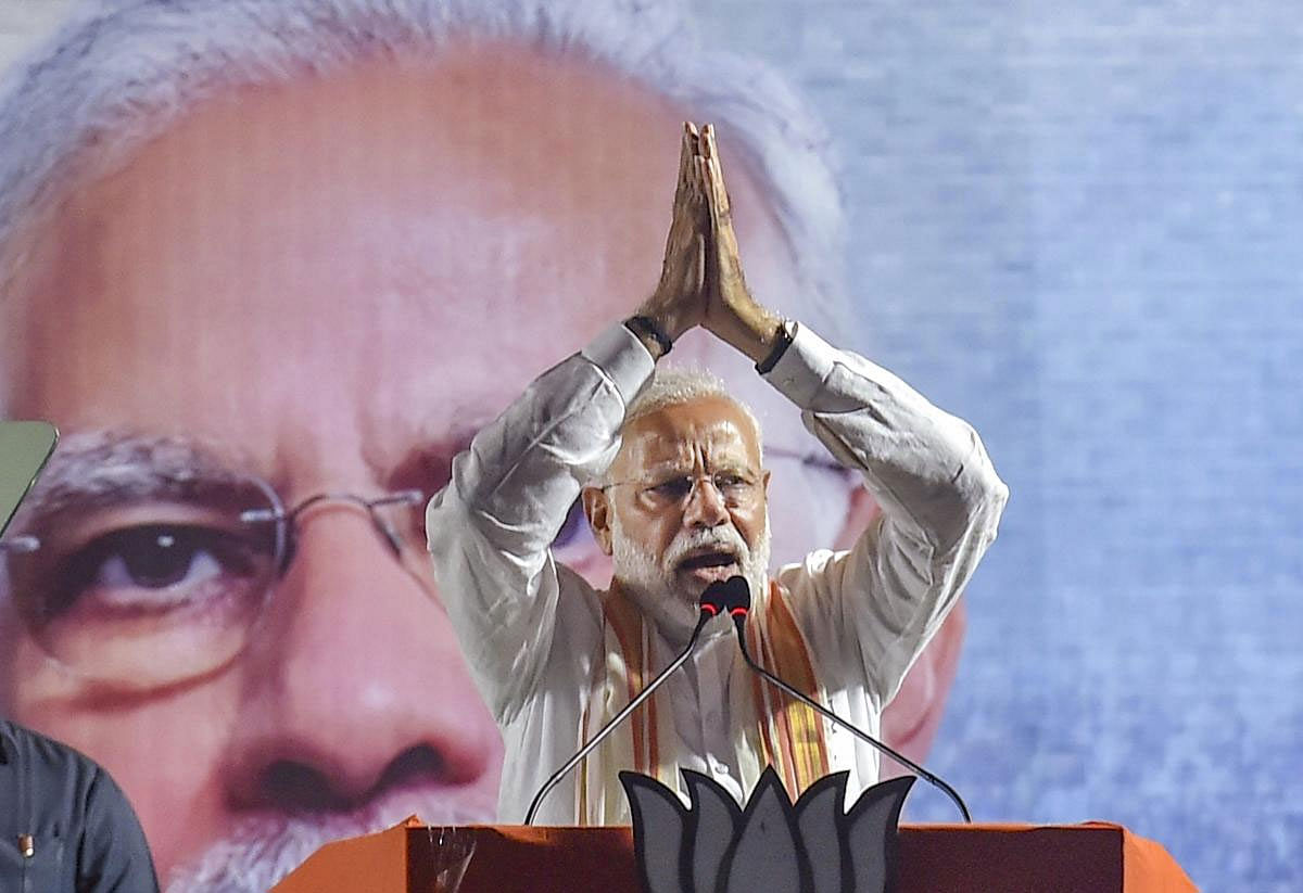 Prime Minister Narendra Modi addresses an election campaign rally in support of BJP candidate Nilanjan Roy for Diamond Harbour constituency seat, in South 24 Parganas districts of West Bengal, Wednesday, May15, 2019. (PTI Photo)