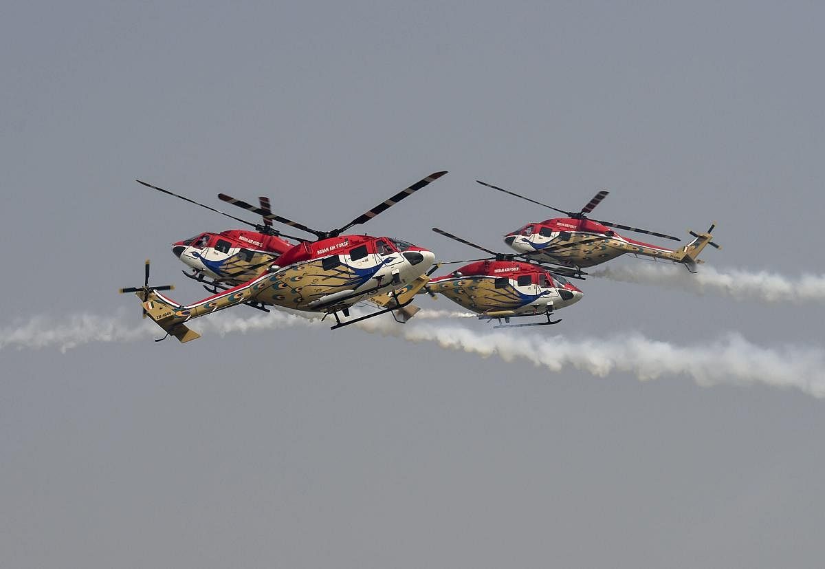 'Sarang' helicopter aerobatic team of Indian Air Force performs at the 86th Air Force Day Parade 2018, at Air Force Station, Hindon in Ghaziabad. (PTI photo)