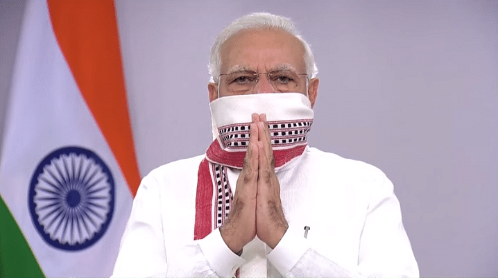 Prime Minister Narendra Modi addresses the nation on COVID-19 via a video link, in New Delhi, Tuesday, April 14, 2020. PM Modi announced extension of the ongoing lockdown till May 3. (Youtube screengrab)