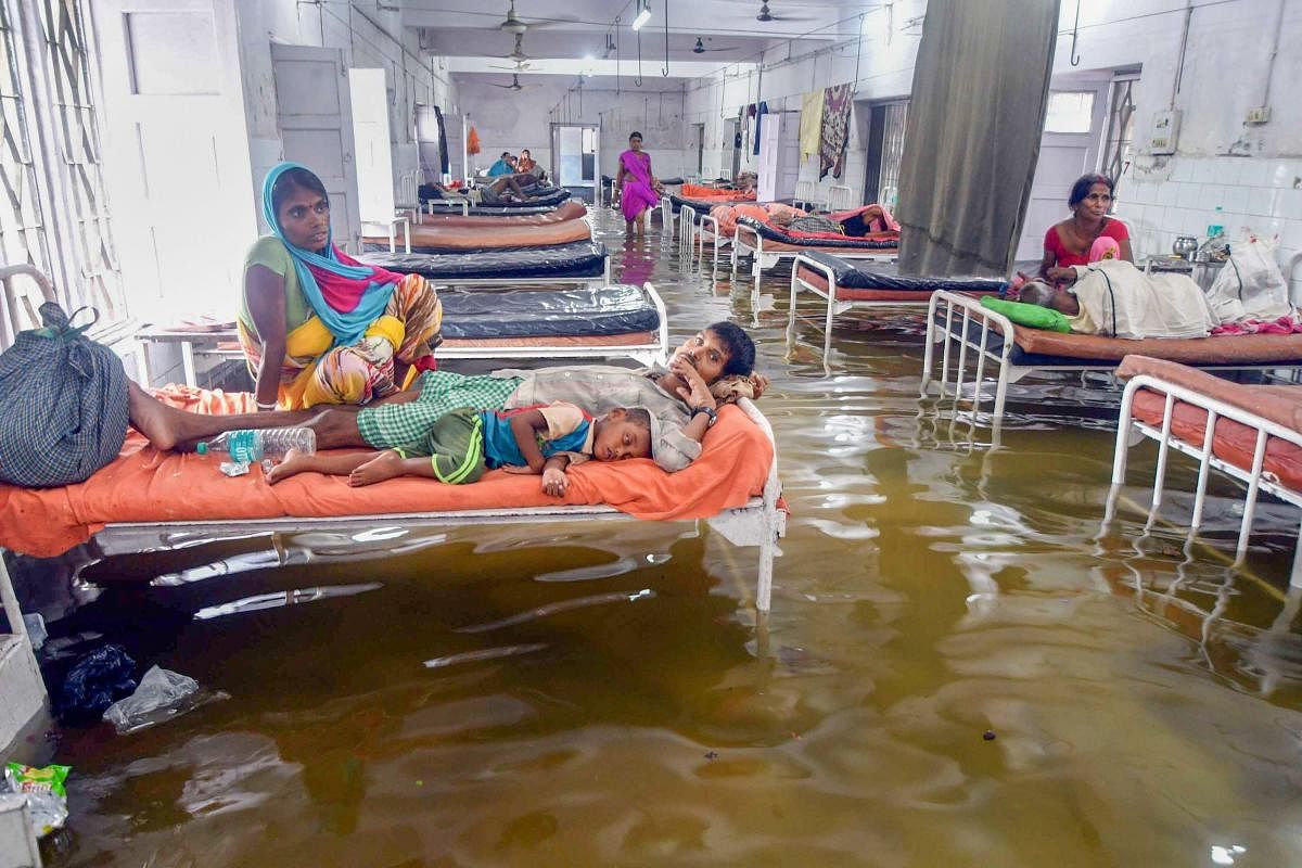 Patna: Waterlogging at Nalanda Medical College and Hospital (NMCH), after heavy monsoon rains in Patna on Saturday, July 28, 2018. (PTI Photo)