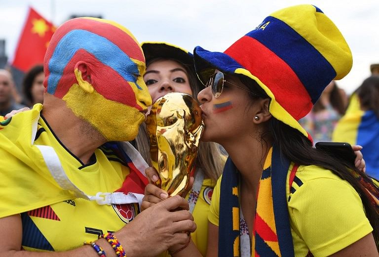 Colombia supporters pose before the Russia 2018 World Cup round of 16 football match between Colombia and England at the Spartak Stadium in Moscow on July 3, 2018.  YURI CORTEZ / AFP
