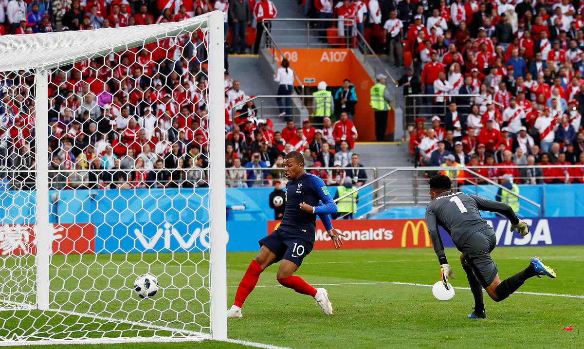 France's Kylian Mbappe scores their first goal REUTERS