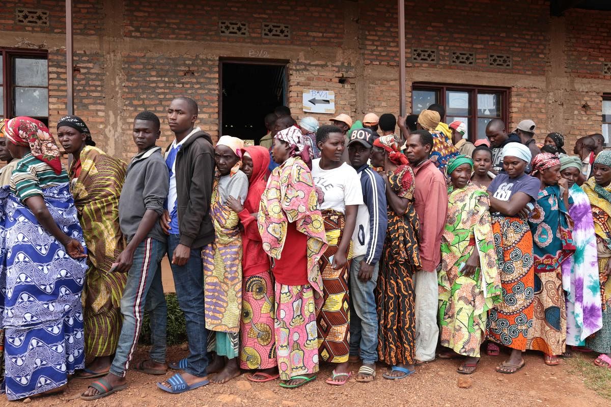 Burundians wait in a line to vote during the presidential and general elections at a polling station at the Bubu Primary school in Giheta, central Burundi, on May 20, 2020. Credit: AFP Photo