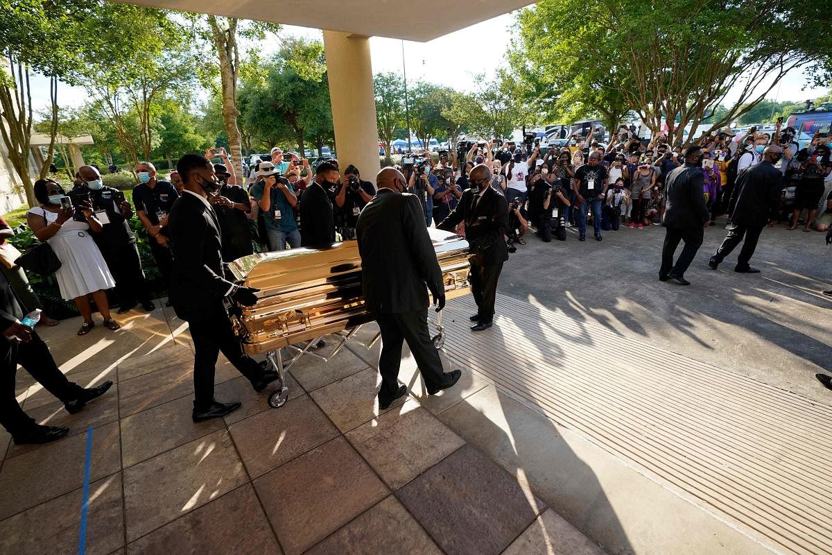 Pallbearers move the casket of George Floyd after a public viewing at the Fountain of Praise church Monday, June 8, 2020, in Houston. Credit/AFP Photo