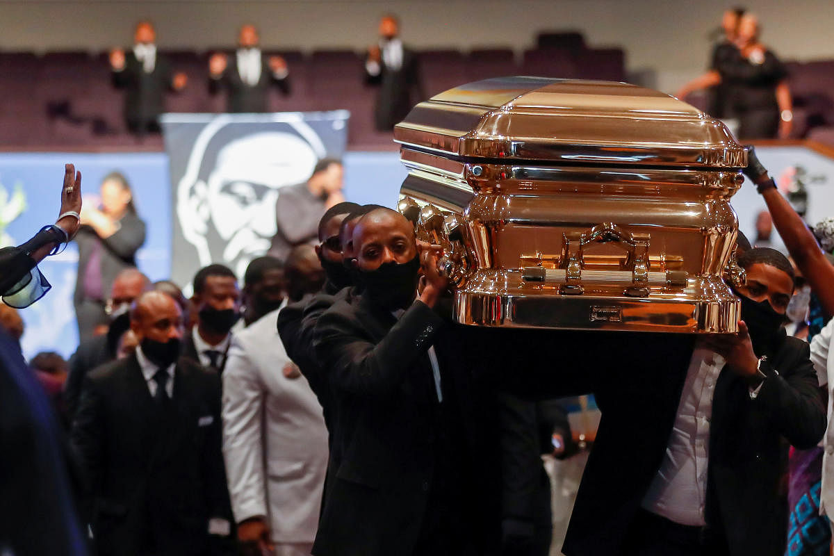 Pallbearers recess out of the church with the casket following the funeral for George Floyd at The Fountain of Praise church in Houston, Texas, U.S., June 9, 2020. Credit/Reuters Photo