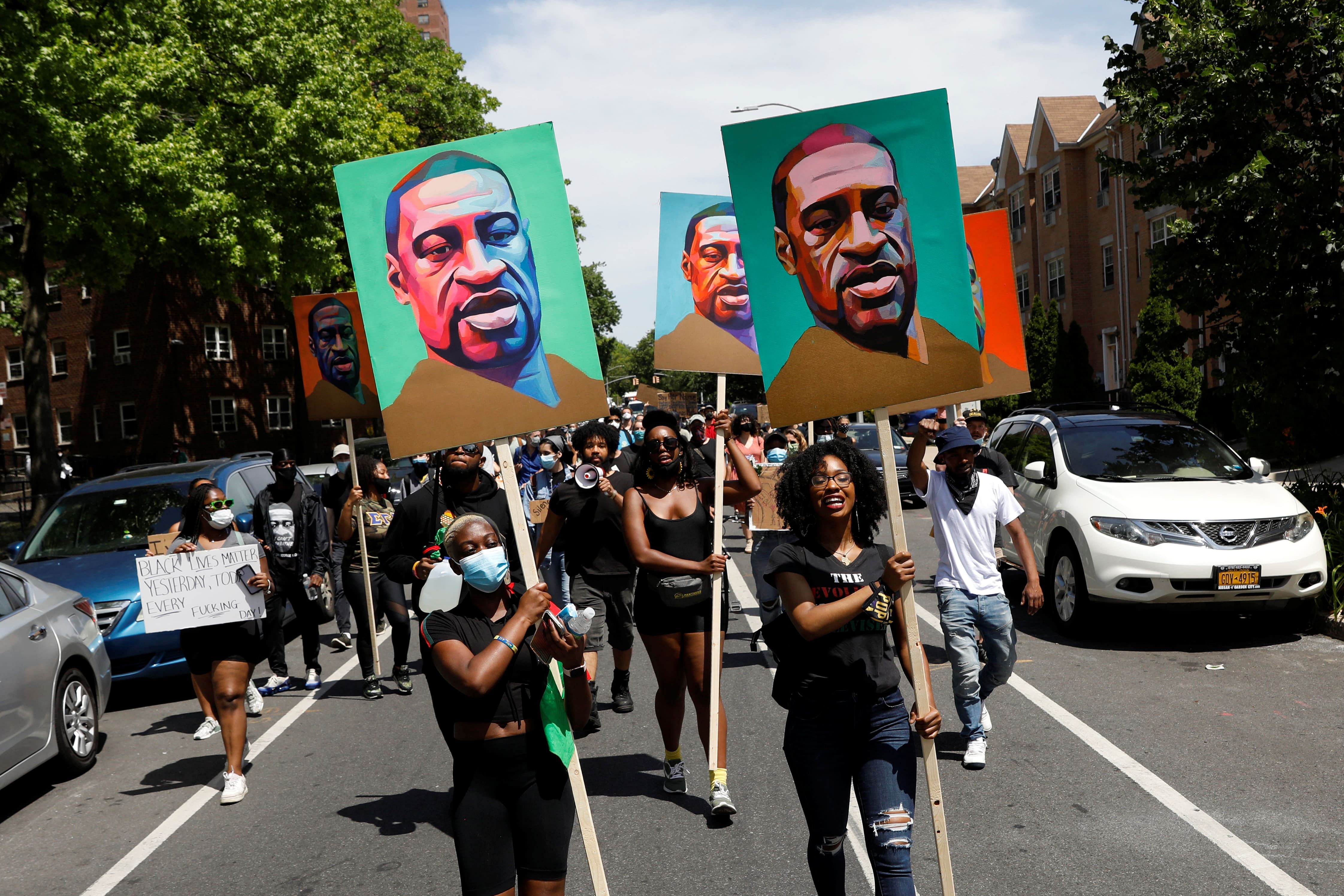 Demonstrators march during a protest against racial inequality in the aftermath of the death in Minneapolis police custody of George Floyd, in Brooklyn. Credit: Reuters Photo