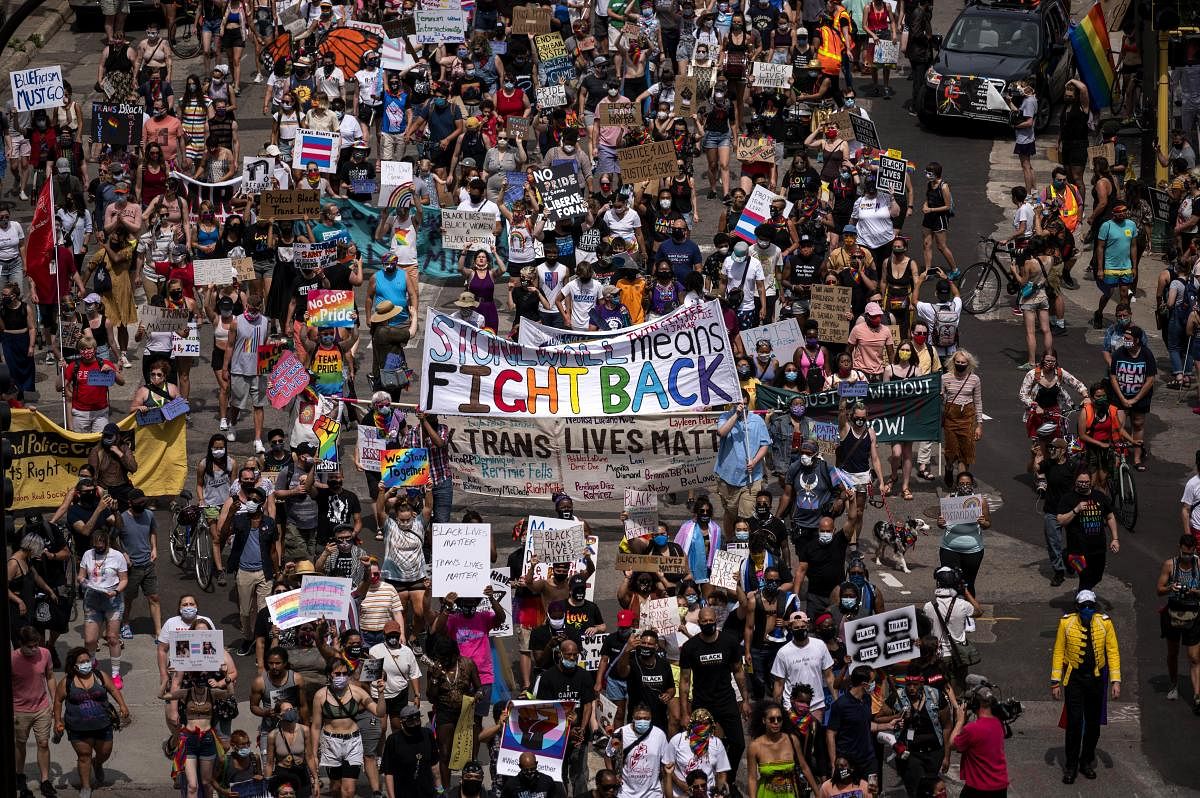A Pride and Black Lives Matter march starts outside the First Police Precinct station on June 28, 2020 in Minneapolis, Minnesota. Although the annual Pride parade had been cancelled due to COVID-19, local organizers arranged a march through downtown Minneapolis to celebrate both Pride and the Black Lives Matter movement. Stephen Maturen/Getty Images/AFP