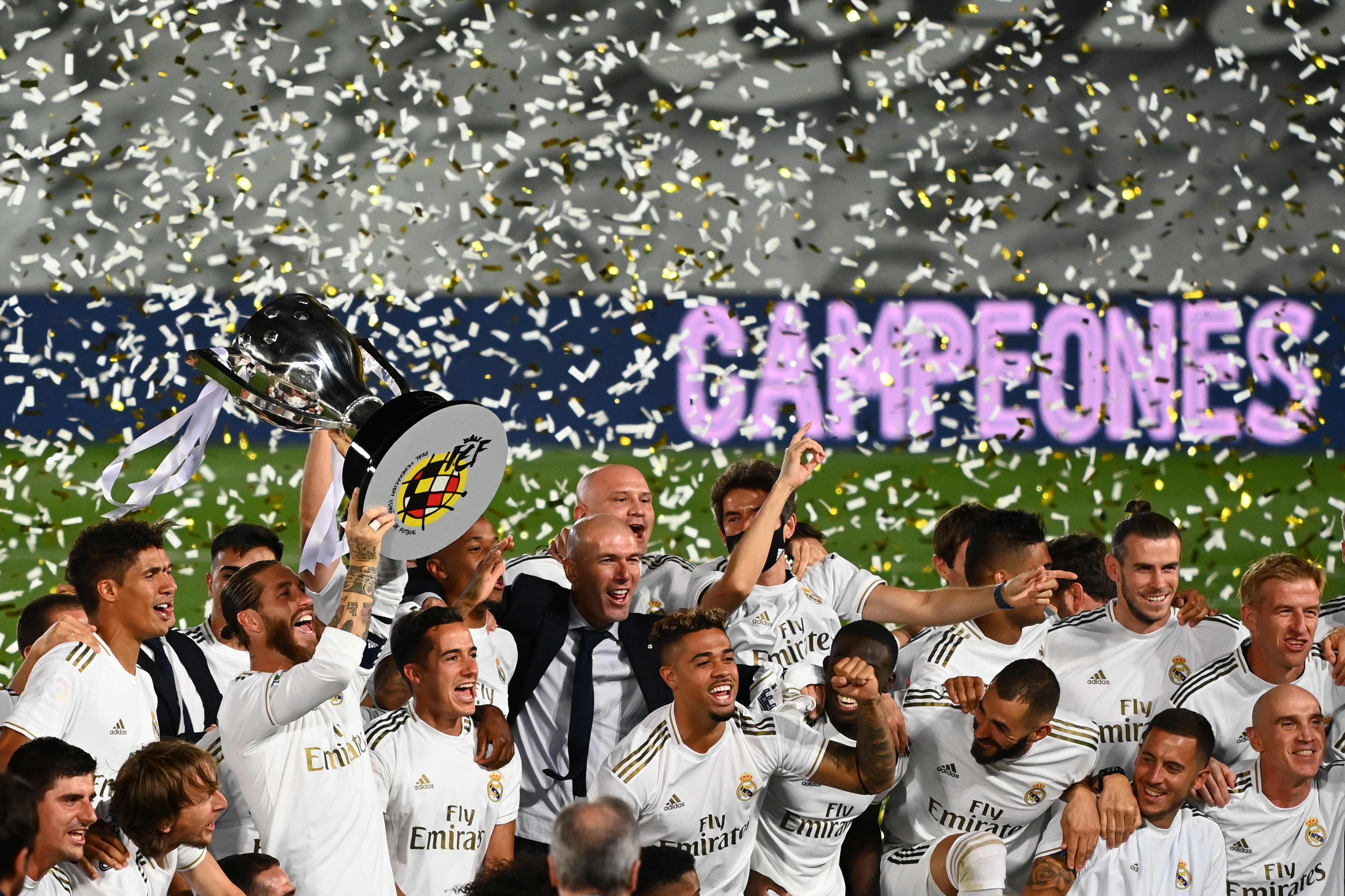 Real Madrid's players celebrate winning the Liga title after the Spanish League football match between Real Madrid CF and Villarreal CF at the Alfredo di Stefano stadium in Valdebebas, on the outskirts of Madrid, on July 16, 2020. Credit: AFP