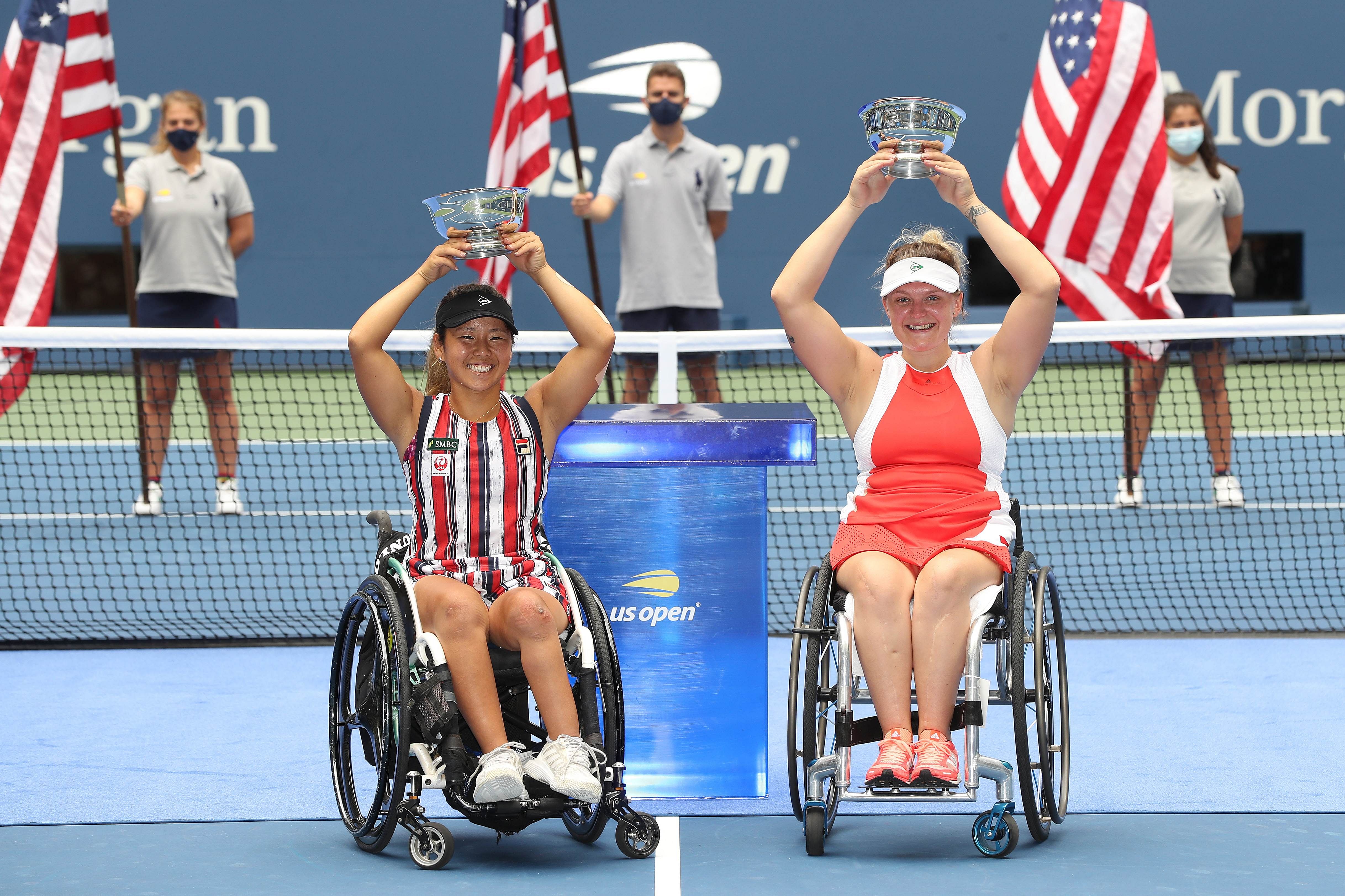 Yui Kamiji of Japan and Jordanne Whiley of Great Britain celebrate with their championship trophies after winning their Wheelchair Women's Doubles final match against Diede De Groot of the Netherlands and Marjolein Buis of the Netherlands on Day Fourteen of the 2020 US Open. Credit: AFP