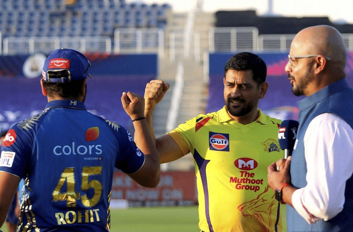 Chennai Super Kings Skipper MS Dhoni and Mumbai Indians Captain Rohit Sharma during the toss for the first cricket match of IPL 2020 at Sheikh Zayed Stadium, Abu Dhabi, UAE. Credit: PTI Photo