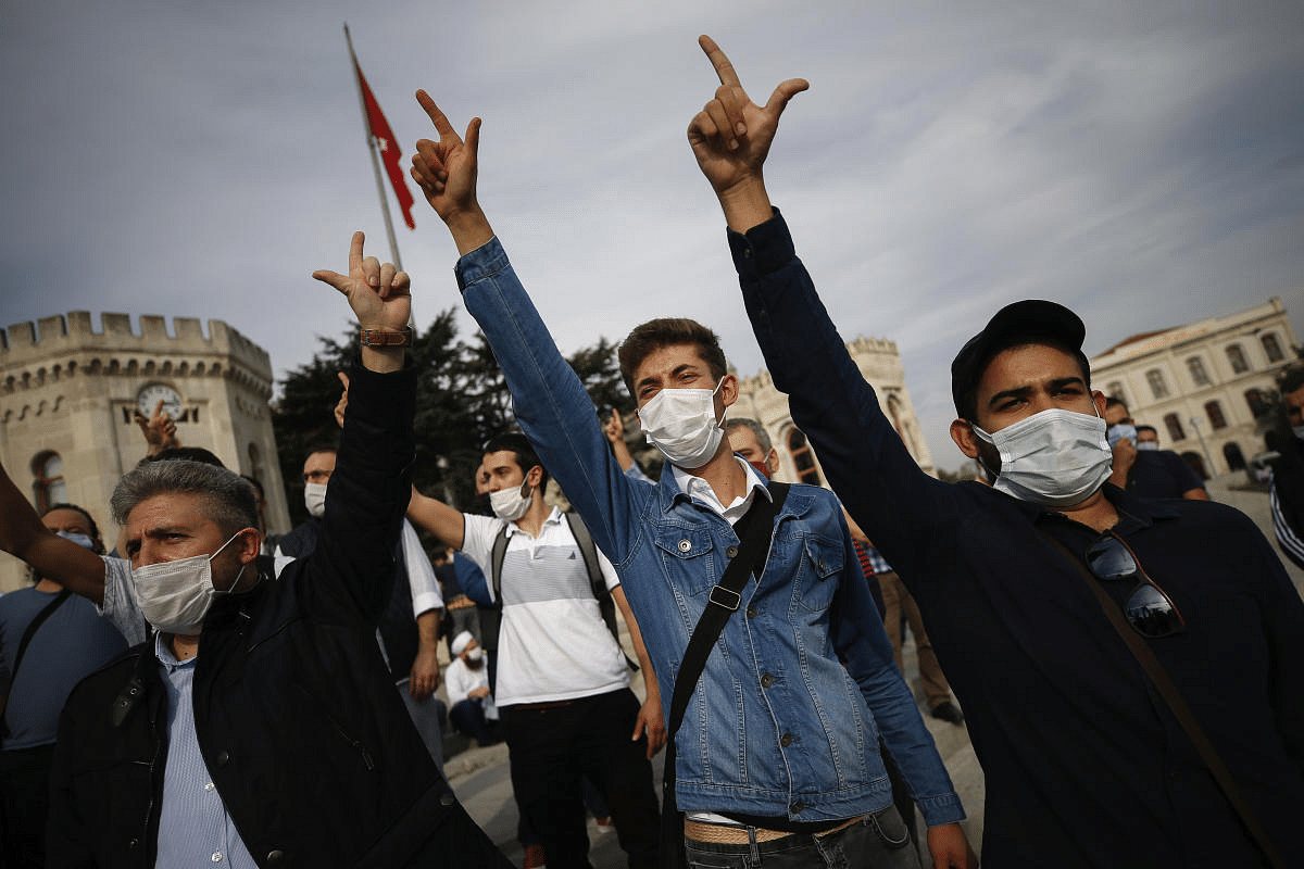 Demonstrators chant slogans during an anti-France protest in Istanbul. Credit: AP Photo