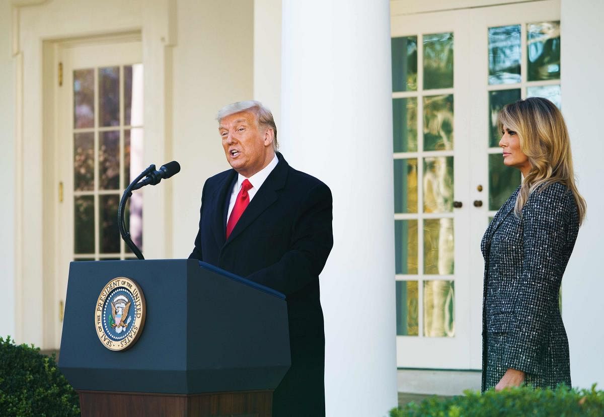 US President Donald Trump speaks during the annual Thanksgiving turkey pardon watched by First Lady Melania Trump in the Rose Garden of the White House in Washington, DC. Credit: AFP Photo