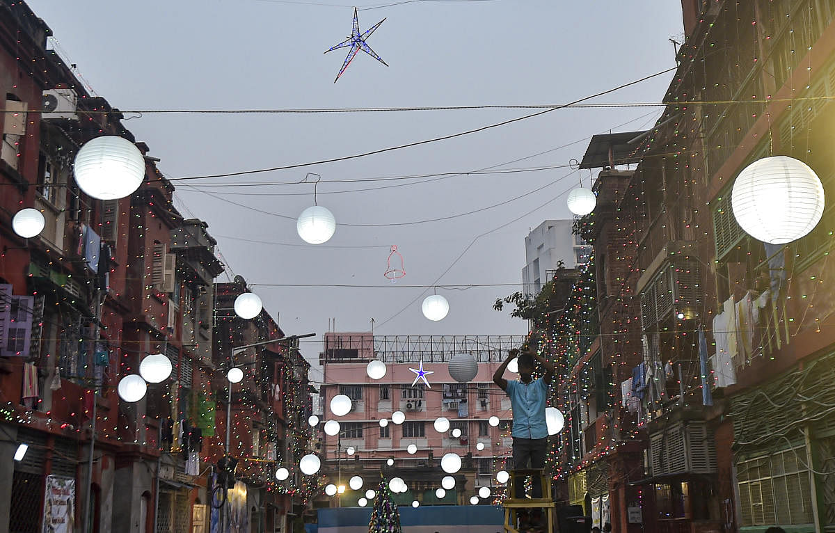 India gears for Christmas amid Covid-19 | City streets of Bow Barracks illuminated for the upcoming Christmas festival in Kolkata, Tuesday, Dec 22, 2020. The locality is a small hub of mainly Anglo-Indian population. Credit: PTI Photo