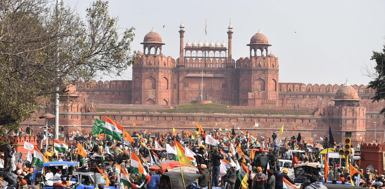 Farmers gather at Red Fort during their tractor parade on Republic Day, in New Delhi. Credit: PTI photo. 
