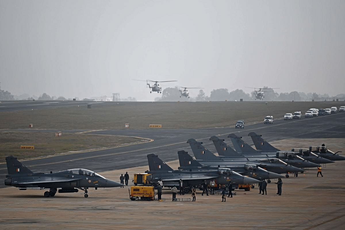 Indian Air Force (IAF) fighter jets are seen on the tarmac during the first day of the Aero India 2021 Airshow at the Yelahanka Air Force Station in Bengaluru. Credit: AFP Photo