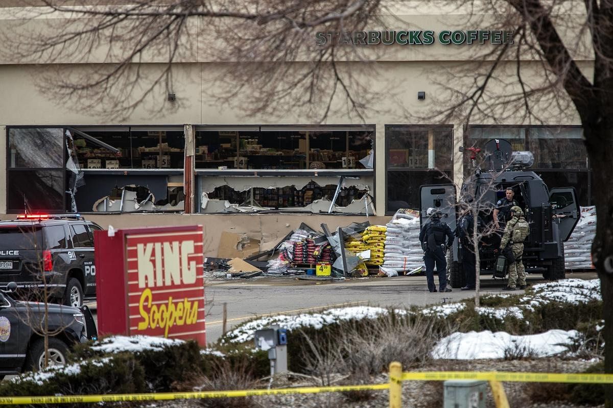 Tactical police units respond to the scene of a King Soopers grocery store after a shooting in Boulder, Colorado. Credit: AFP Photo