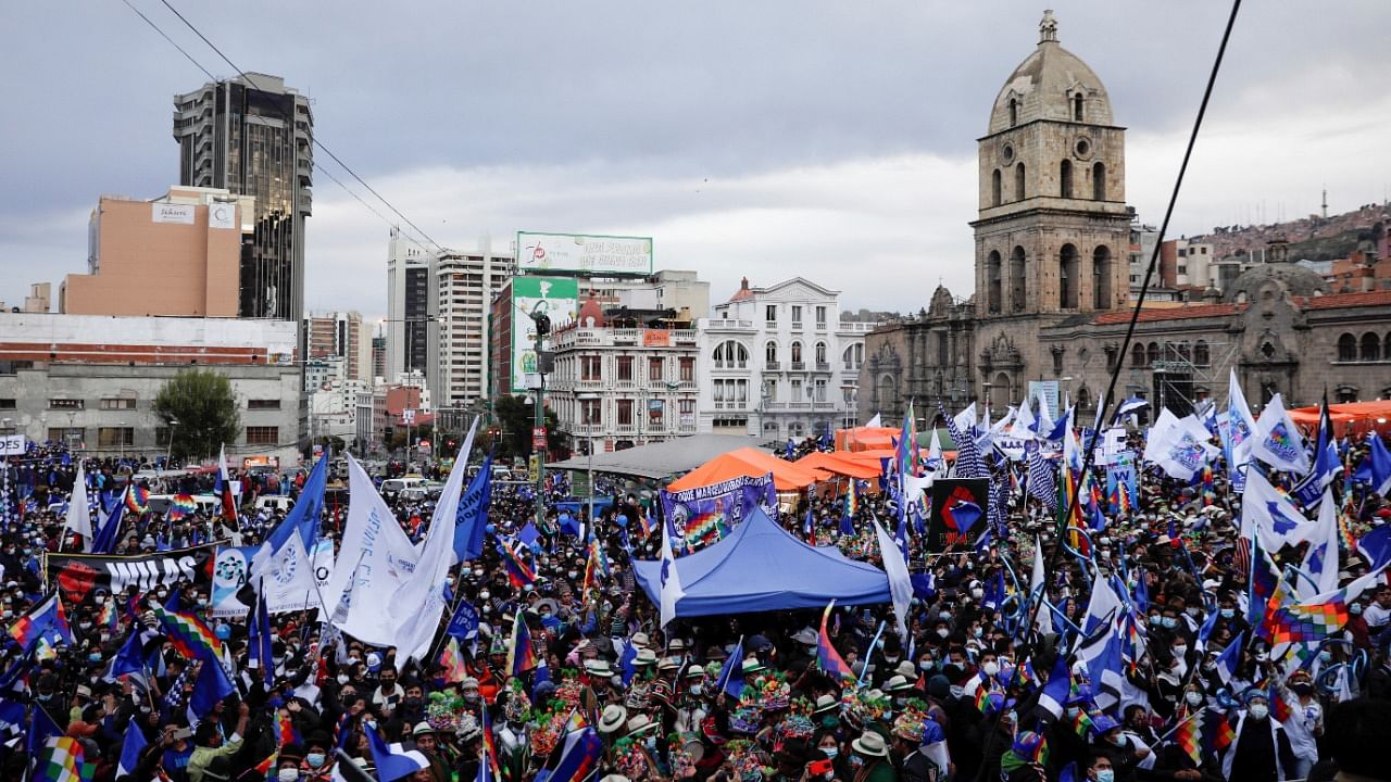 Supporters attend a rally marking the 26th anniversary of the founding of the Movement for Socialism (MAS) party at Plaza San Francisco in La Paz, Bolivia, March 29, 2021. Credit: Reuters Photo