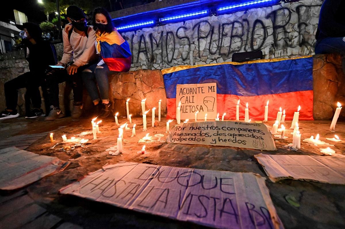 Demostrators make a vigil for fellow demonstrators who died, disappeared or were wounded in the past days' protests against a tax reform bill launched by President Ivan Duque in Cali, Colombia, on May 2, 2021. Credit: AFP Photo