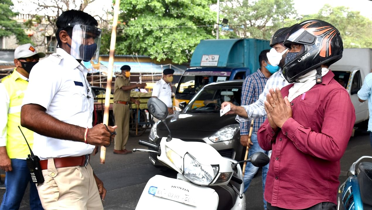 Karnataka Covid-19 Lockdown: Cops wield lathis on violators; see pics