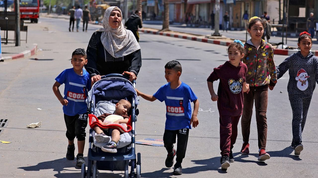 In Pics | Palestinians flee Gaza as Israeli airstrikes continue