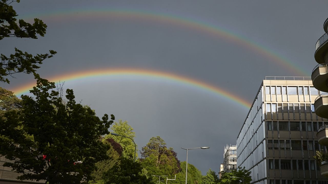 Beautiful 'double rainbow' brightens up the Switzerland sky