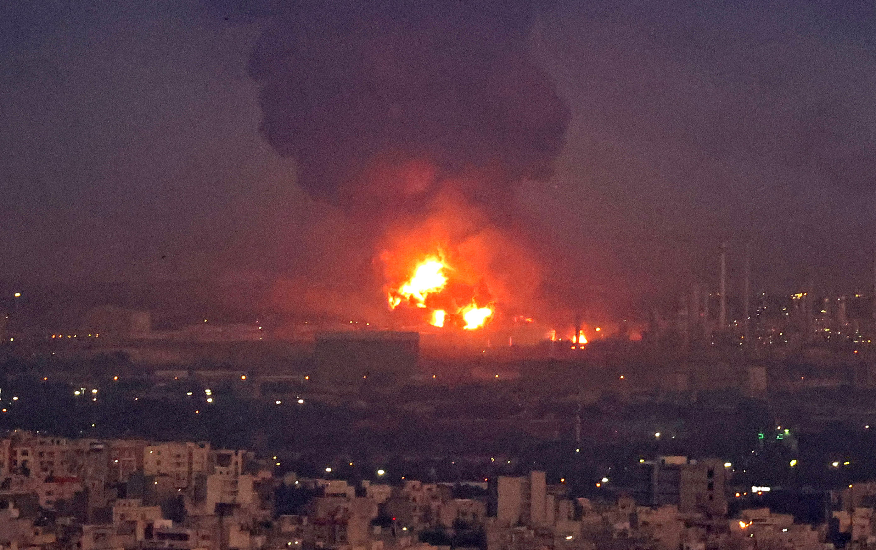 A fierce blaze broke out at a refinery in southern Tehran after a liquefied gas line leaked and exploded, the head of the capital's crisis team said on state television. Credit: AFP Photo