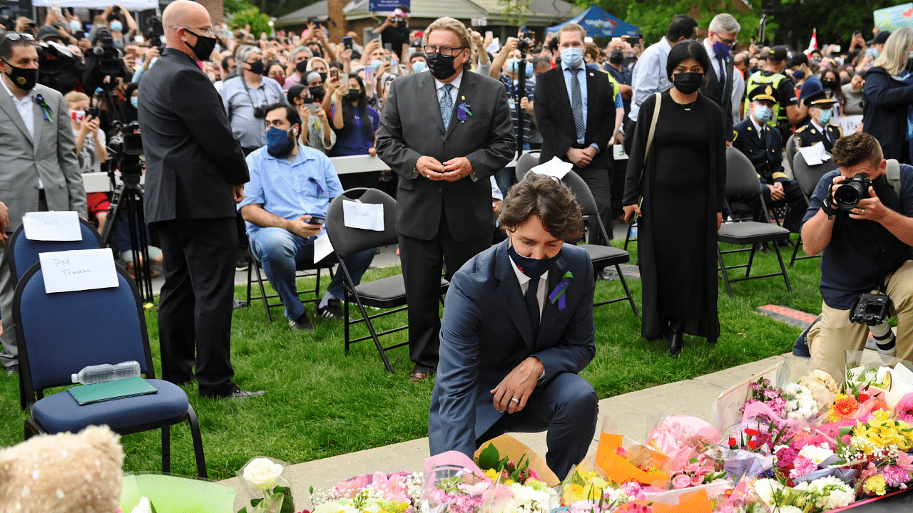 Canadian Prime Minister Justin Trudeau lays flowers at a vigil outside the London Muslim Mosque organized after four members of a Canadian Muslim family were killed in what police describe as a hate-motivated attack in London, Ontario, Canada. Credit: Reuters Photo