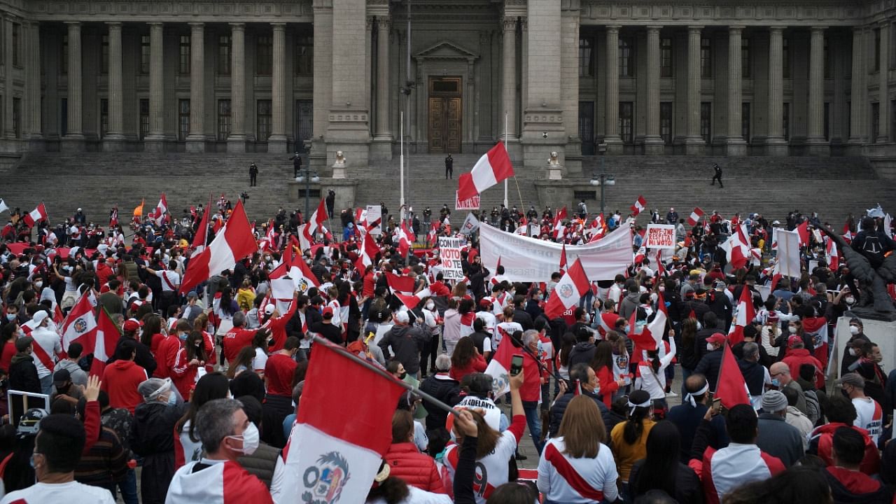 Supporters of Peru's presidential candidate Keiko Fujimori gather outside the Palace of Justice, the seat of Peru's Supreme Court, during a demonstration in Lima. Credit: Reuters Photo