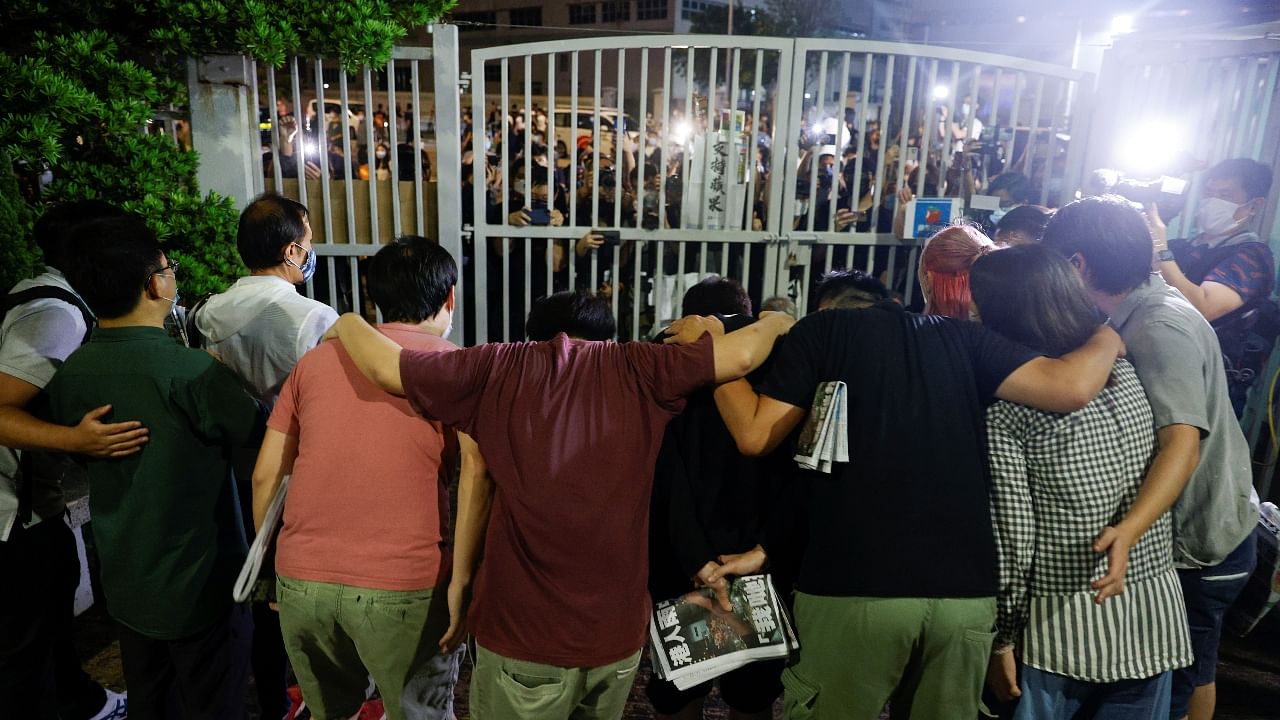 Emotional scenes as hundreds bid poignant farewell to Hong Kong's Apple Daily