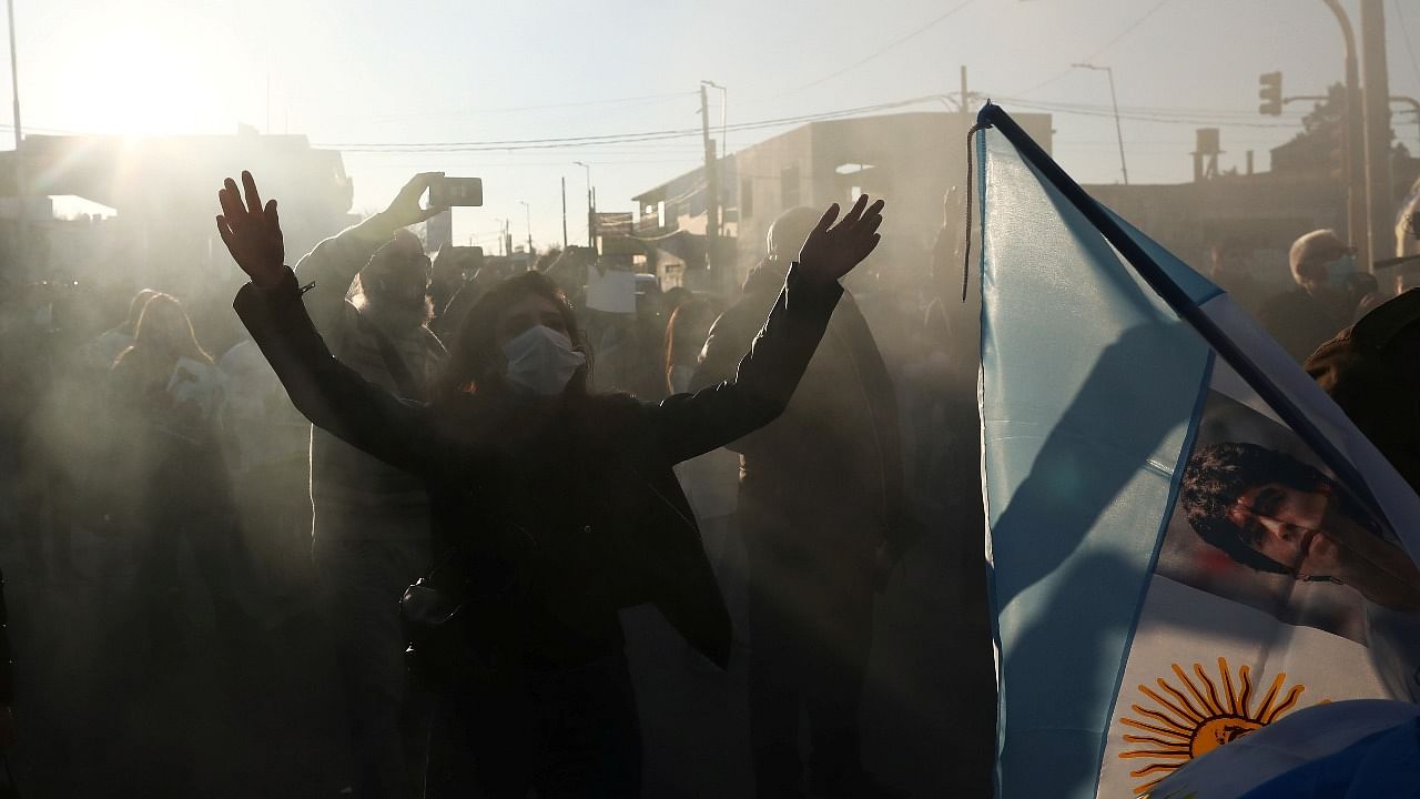 Fans of Argentine soccer superstar Diego Armado Maradona celebrate the idol's 35th anniversary of the "goal of the century", against England during the 1986 World Cup played in Mexico, in Buenos Aires. Credit: Reuters photo