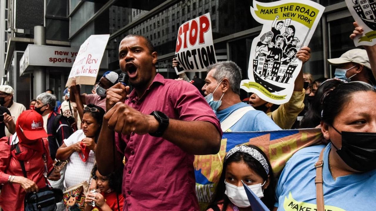 People participate in a protest against New York Governor Andrew Cuomo and protest for a moratorium on evictions in New York City. Credit: AFP Photo