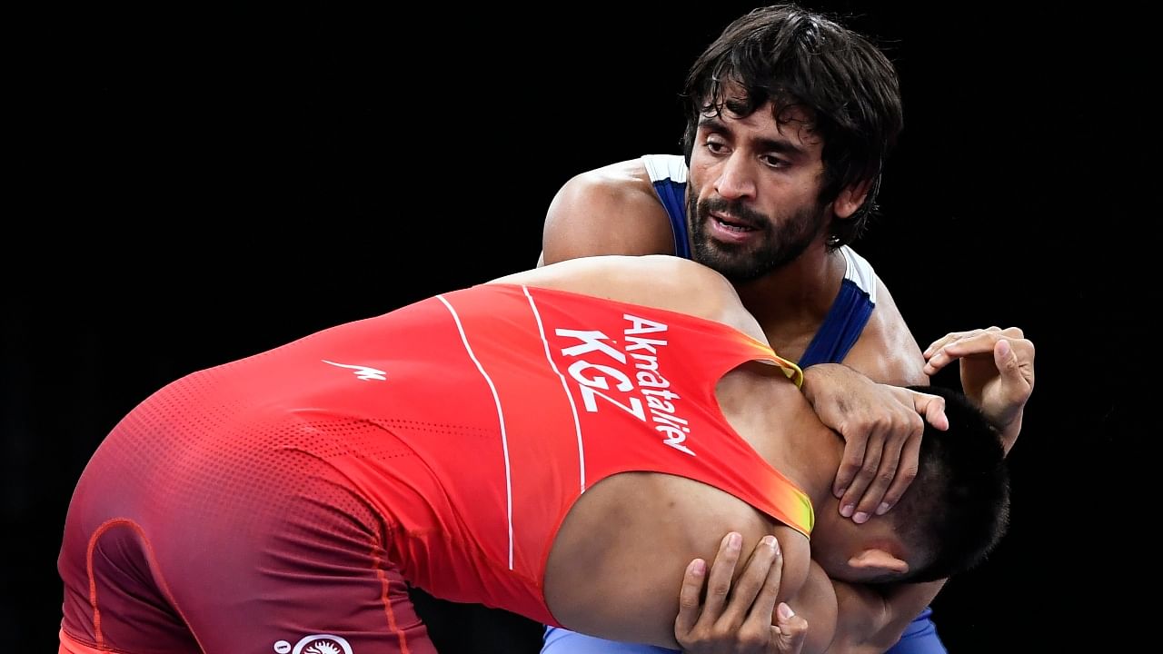 Wrestler Bajrang Punia pins Morteza Ghiasi, cruises into semis finals; See match pics! Credit: Reuters Photo