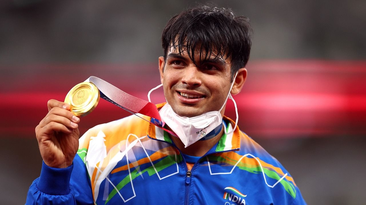 In Pics | Neeraj Chopra wins first-ever athletics Olympic gold for India