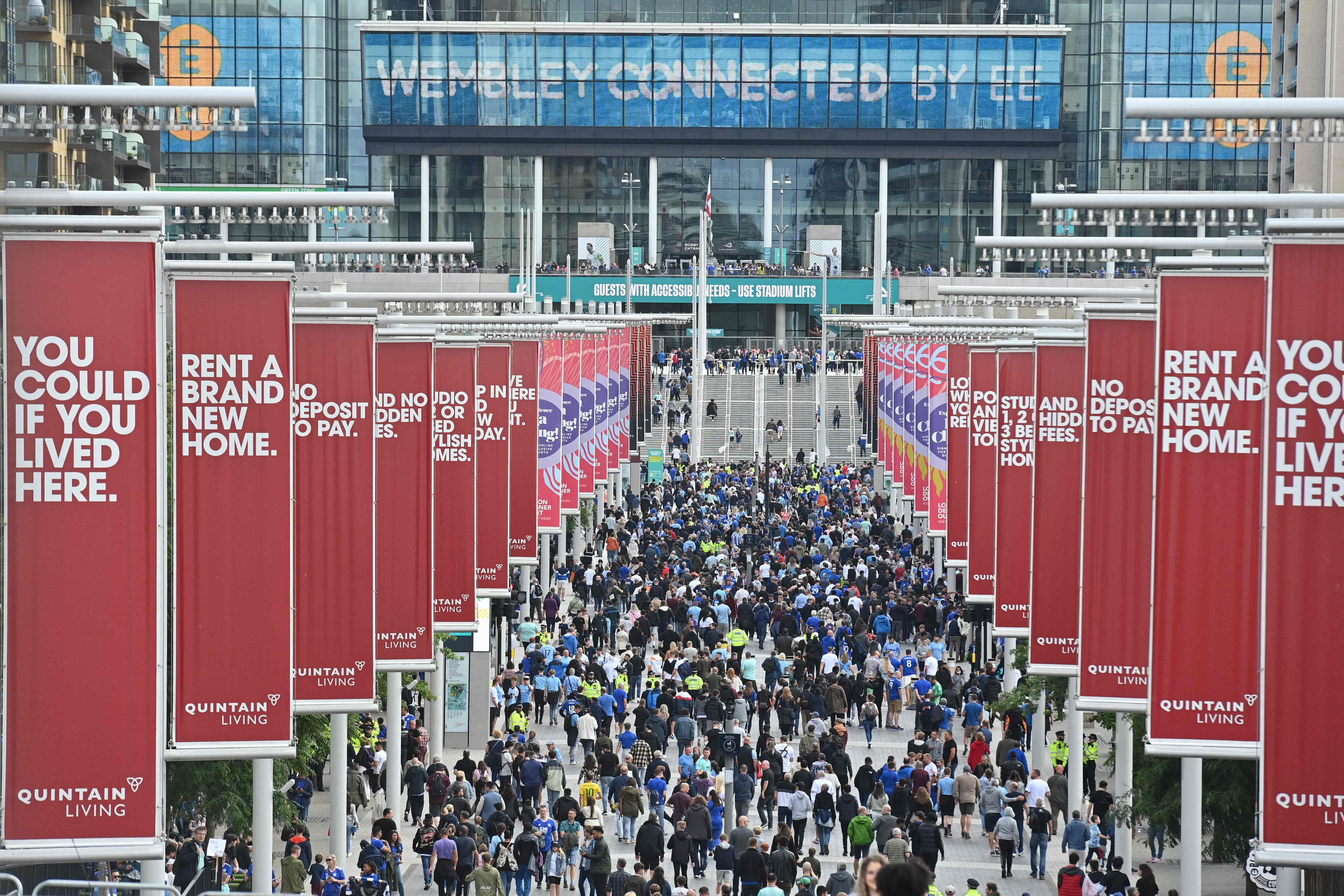 Spectators arrive at Wembley Stadium in north London on August 7, 2021 to watch the English FA Community Shield football match between Manchester City and Leicester City. Credi: AFP Photo