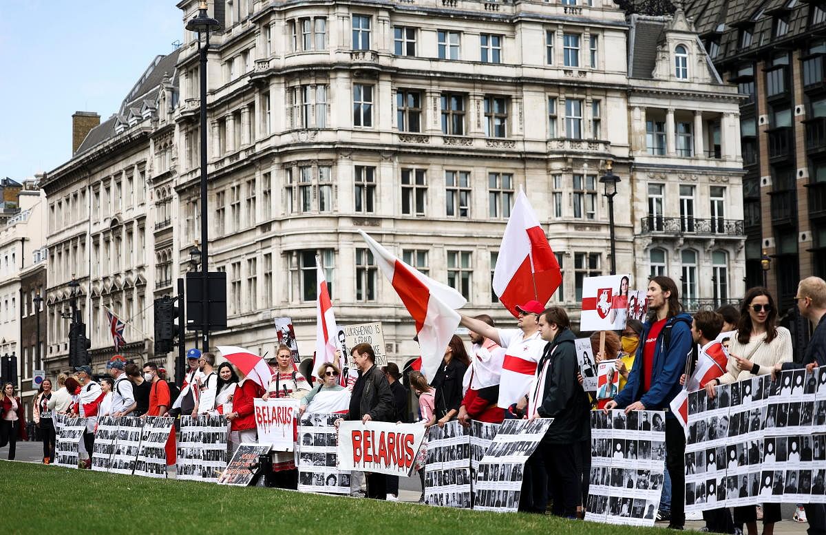 Demonstrators gather on Parliament Square for the Global Solidarity Event for Belarus protest in London. Credit: Reuters Photo