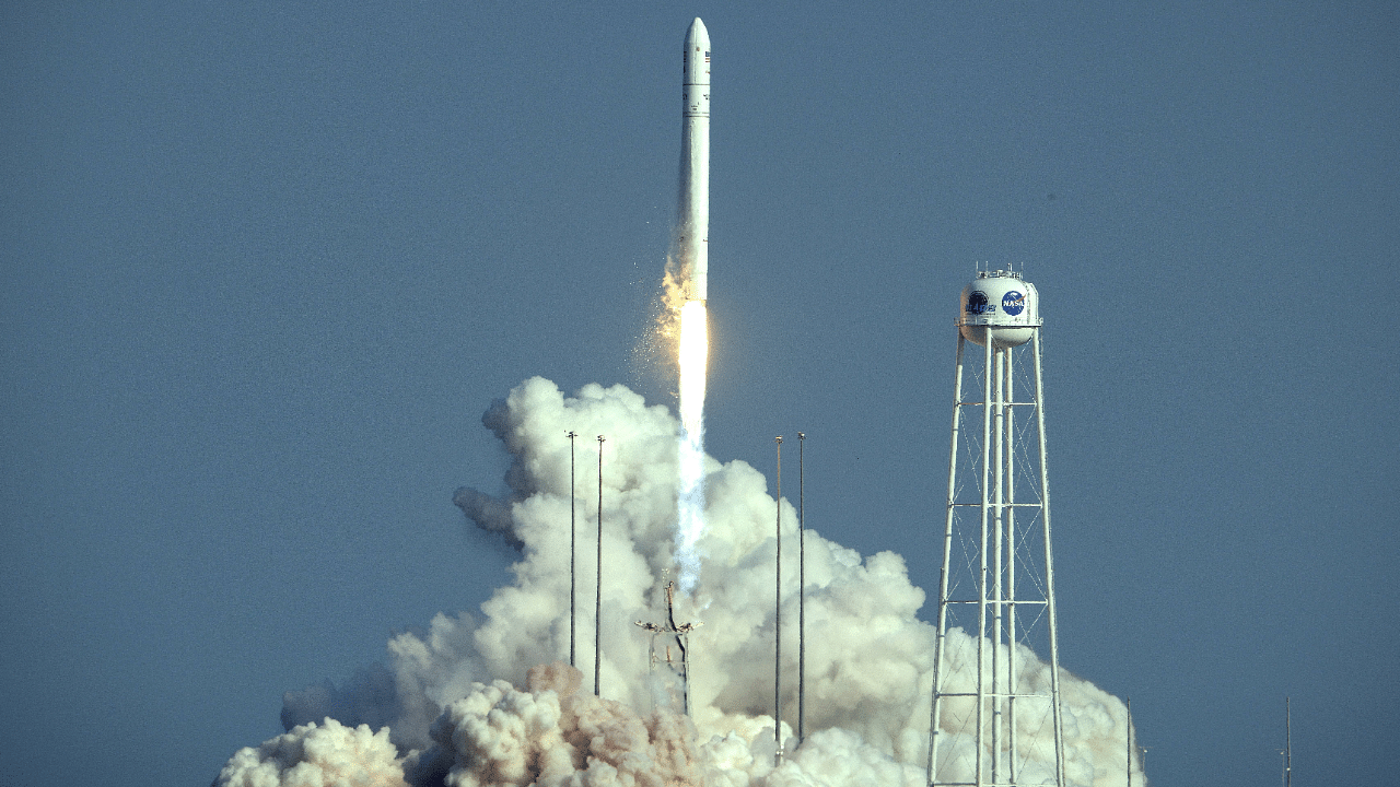A Northrop Grumman Antares rocket, carrying the Cygnus cargo spacecraft, launches from Pad-0A at NASA's Wallops Flight Facility on August 10, 2021 in Wallops Island, Virginia. Credit: AFP Photo