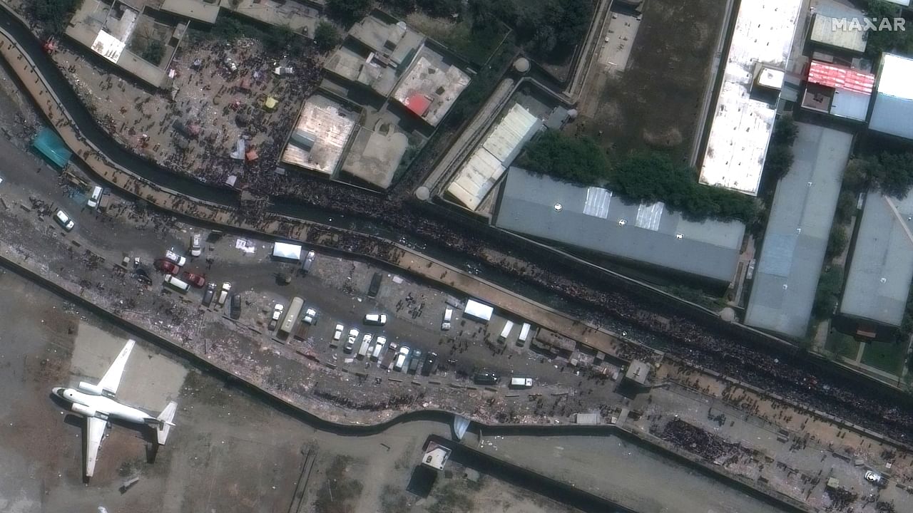 Satellite images show crowds swelling at Kabul airport