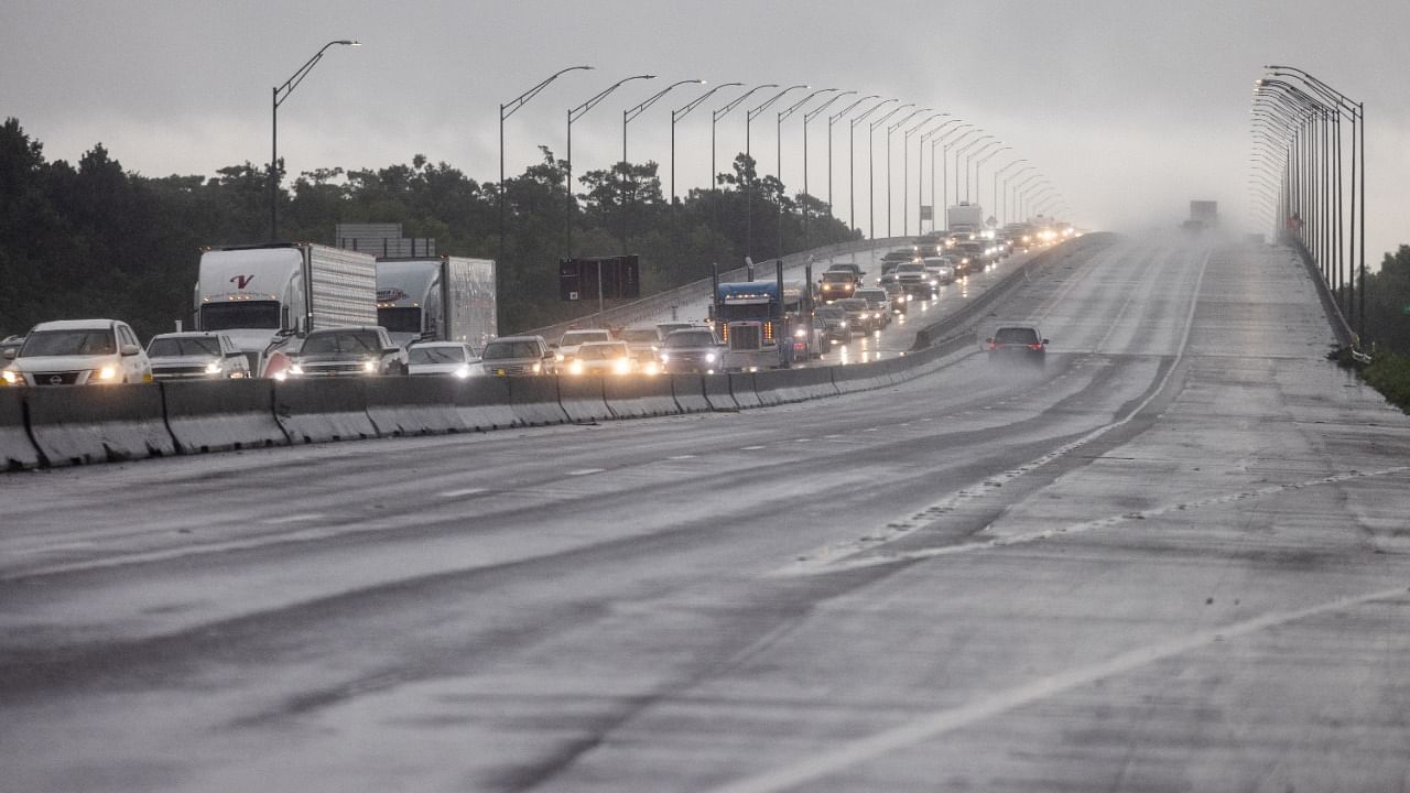 Traffic moves bumper to bumper along I-10 West as residents arrive into Texas from the Louisiana border ahead of Hurricane Ida in Orange, Texas, US, August 28, 2021. Credit: Reuters photo