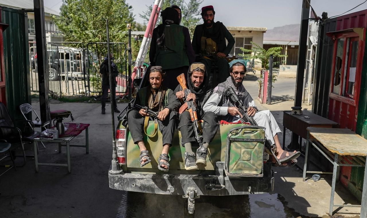 Once prisoners, Taliban fighters are now the guards in Afghanistan jail Credit: AFP Photo