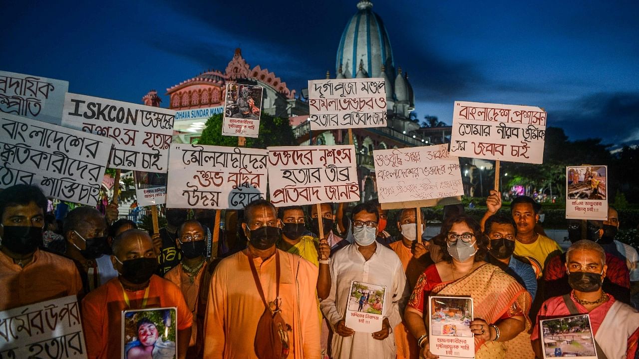 ISKCON members stage a protest against the attack on devotees in Bangladesh Credit: AFP Photo