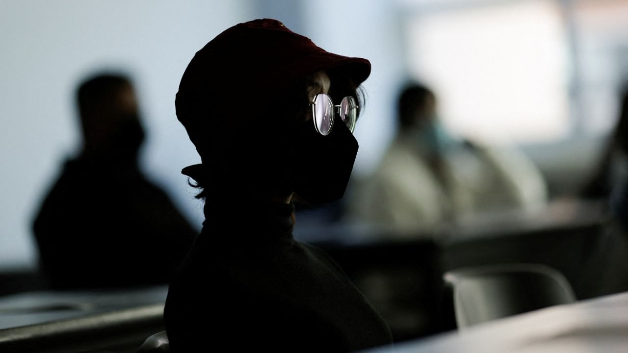 A university student wearing a protective mask attends face-to-face classes inside a classroom, after a year and ten months of online lessons, as the Covid-19 outbreak continues, in Ciudad Juarez, Mexico. Credit: Reuters Photo
