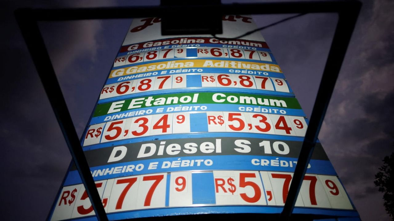 Gasoline prices are displayed at a gas station following the announcement of updated fuel prices at at the Brazilian oil company Petrobras in Brasilia. Credit: Reuters photo