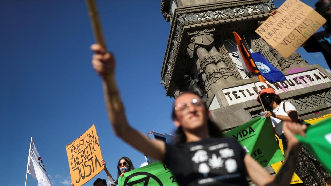 Members of environmental organizations hold a protest against climate change on Earth Day in Mexico City. Credit: Reuters photo