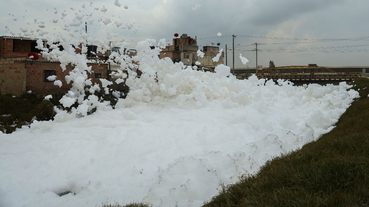 Residents flee as polluted river produces toxic foam in Bogota, Colombia